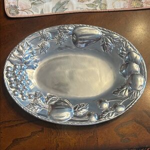 Pewter dish with fruit design